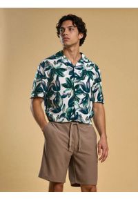 Sinsay - Szorty basic - beżowy. Kolor: beżowy