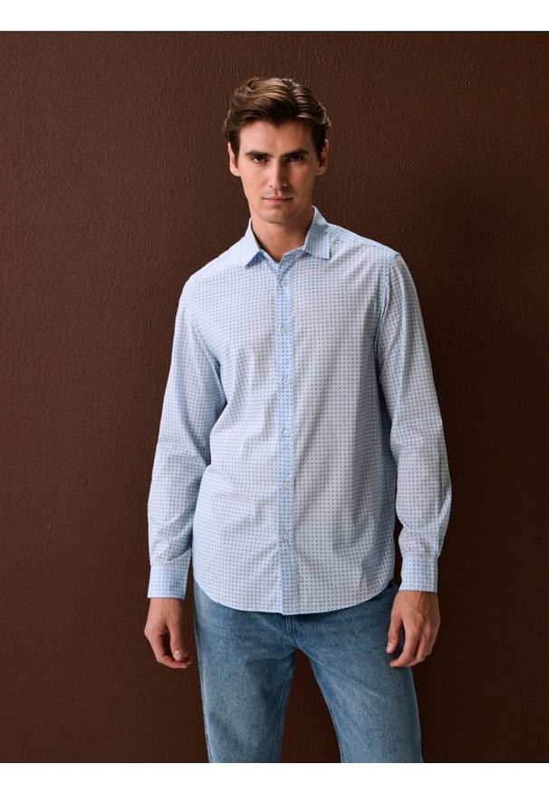 Sinsay - Koszula z długim rękawem we wzory - błękitny. Kolor: niebieski. Długość rękawa: długi rękaw. Długość: długie