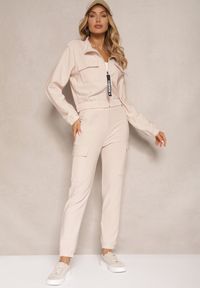 Renee - Beżowy Komplet Dresowy z Bluzą ze Stójką i Spodniami Typu Jogger Ozdobiony Kieszeniami Riadara. Kolor: beżowy. Materiał: dresówka. Wzór: aplikacja