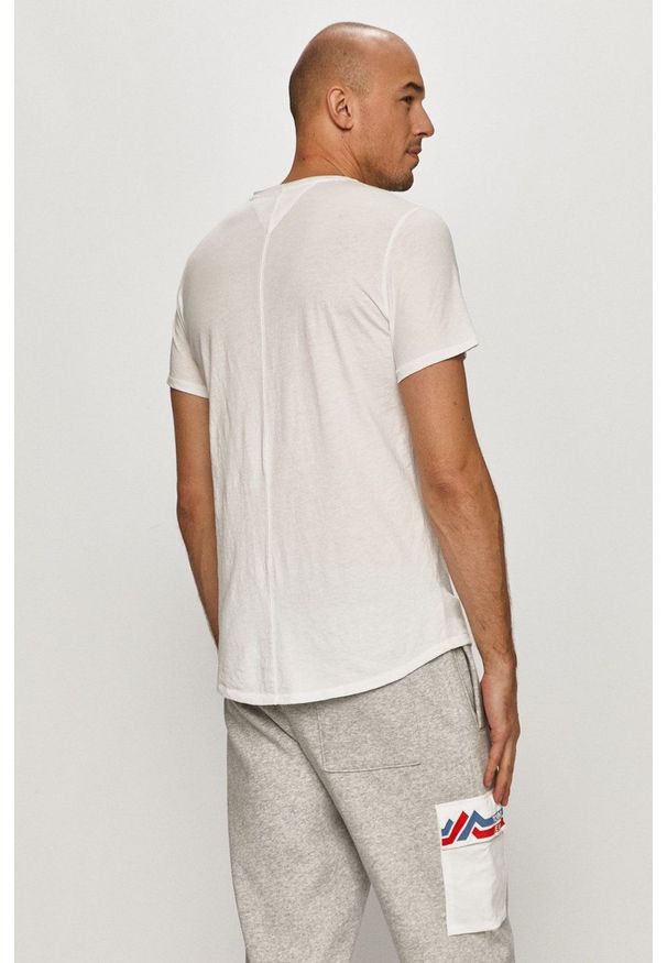 Tommy Jeans - T-shirt. Okazja: na co dzień. Kolor: biały. Materiał: dzianina. Wzór: gładki. Styl: casual