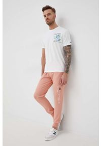 TOMMY HILFIGER - Tommy Hilfiger spodnie dresowe bawełniane męskie kolor różowy z aplikacją. Kolor: różowy. Materiał: bawełna, dresówka. Wzór: aplikacja #2