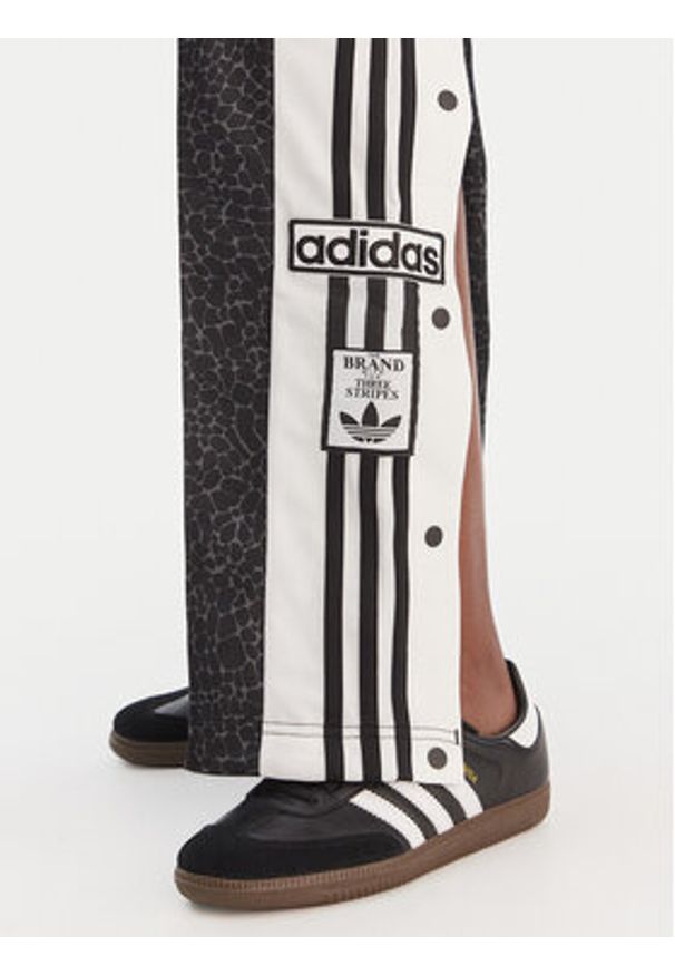 Adidas - adidas Spodnie dresowe Adibreak KD2830 Czarny Loose Fit. Kolor: czarny. Materiał: syntetyk