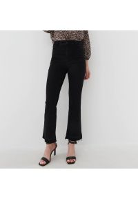 Mohito - Jeansy flare - Czarny. Kolor: czarny. Materiał: jeans #1