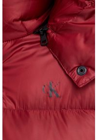 Calvin Klein Jeans Kurtka puchowa damska kolor bordowy zimowa oversize. Kolor: czerwony. Materiał: puch. Wzór: gładki. Sezon: zima