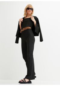 bonprix - Spodnie poszerzane w tenisowe prążki. Kolor: czarny. Wzór: prążki #2