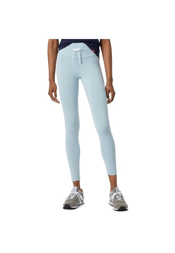 Spodnie New Balance WP21556MGF - niebieskie. Kolor: niebieski. Materiał: poliester, bawełna