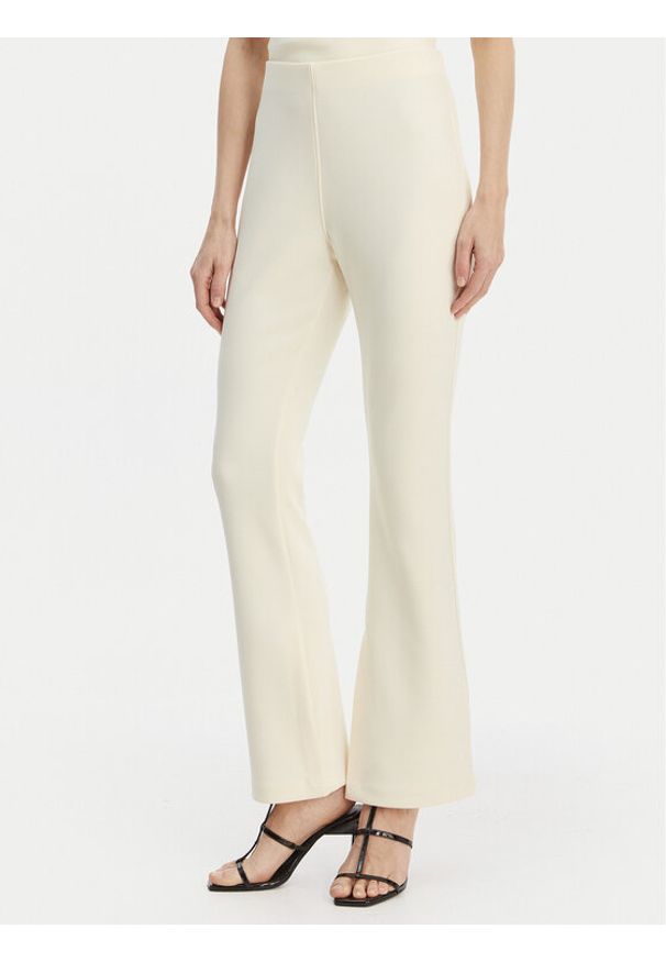 Calvin Klein Spodnie materiałowe LV044B223G Beżowy Flare Fit. Kolor: beżowy. Materiał: syntetyk
