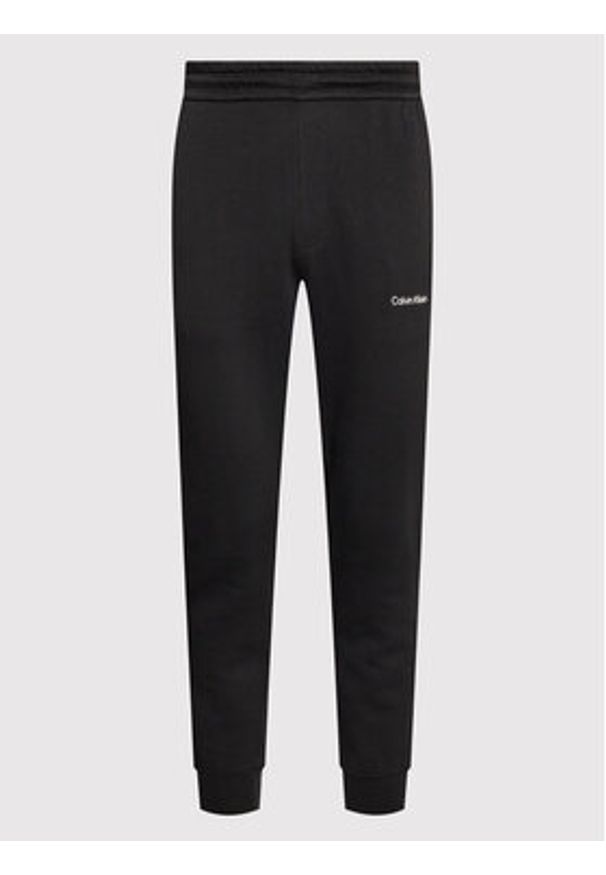 Calvin Klein Spodnie dresowe Micro Logo K10K109940 Czarny Relaxed Fit. Kolor: czarny. Materiał: syntetyk, bawełna