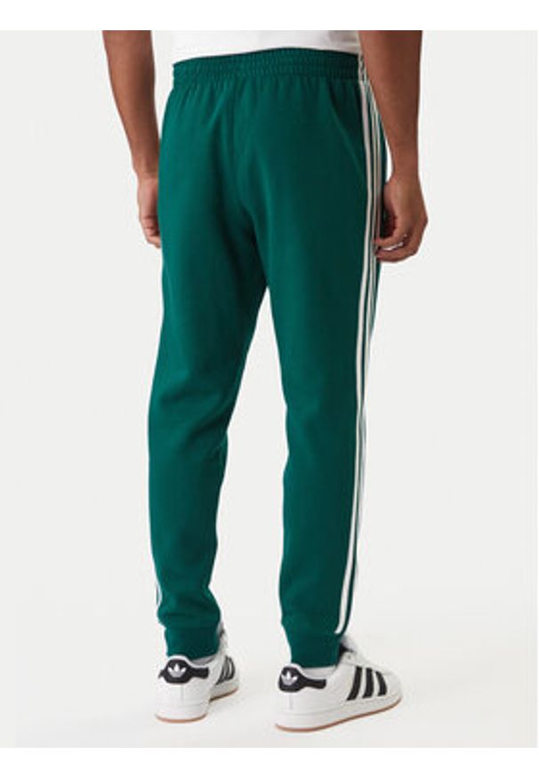 Adidas - adidas Spodnie dresowe 3-Stripes KE3559 Zielony Slim Fit. Kolor: zielony. Materiał: bawełna