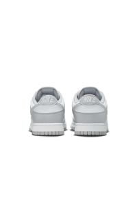 Nike Dunk Low Retro Sneakersy męskie. Okazja: na co dzień. Kolor: biały. Materiał: skóra, syntetyk, materiał, guma. Szerokość cholewki: normalna. Wzór: aplikacja, gładki. Sport: koszykówka #2