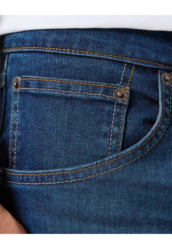 Męskie Spodnie Jeansowe Wrangler Athletic Fit Jagged 112352958. Okazja: na co dzień. Styl: klasyczny, casual