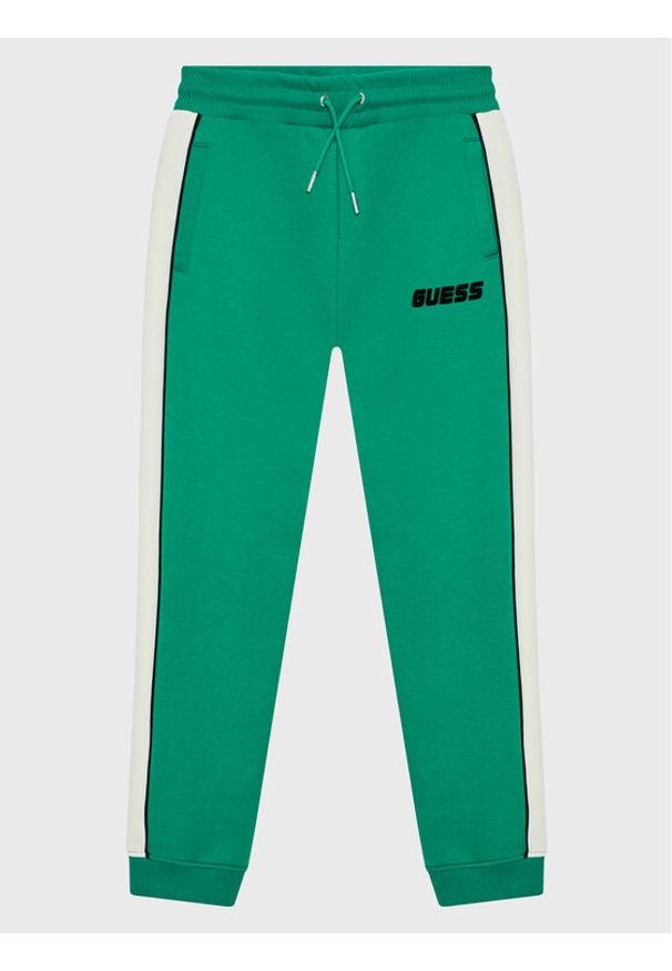 Guess Spodnie dresowe L2BQ19 KBGQ2 Zielony Regular Fit. Kolor: zielony. Materiał: syntetyk