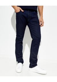 prada - PRADA - Ciemnoniebieskie spodnie jeansowe Straight. Kolor: niebieski. Wzór: aplikacja. Styl: klasyczny #1