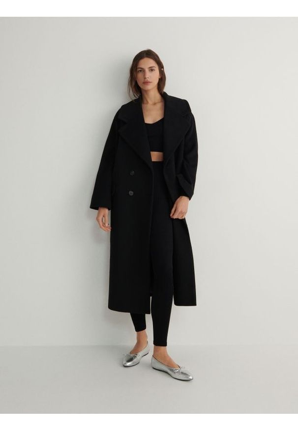 Reserved - Legginsy z metalicznym efektem - czarny. Kolor: czarny. Materiał: dzianina