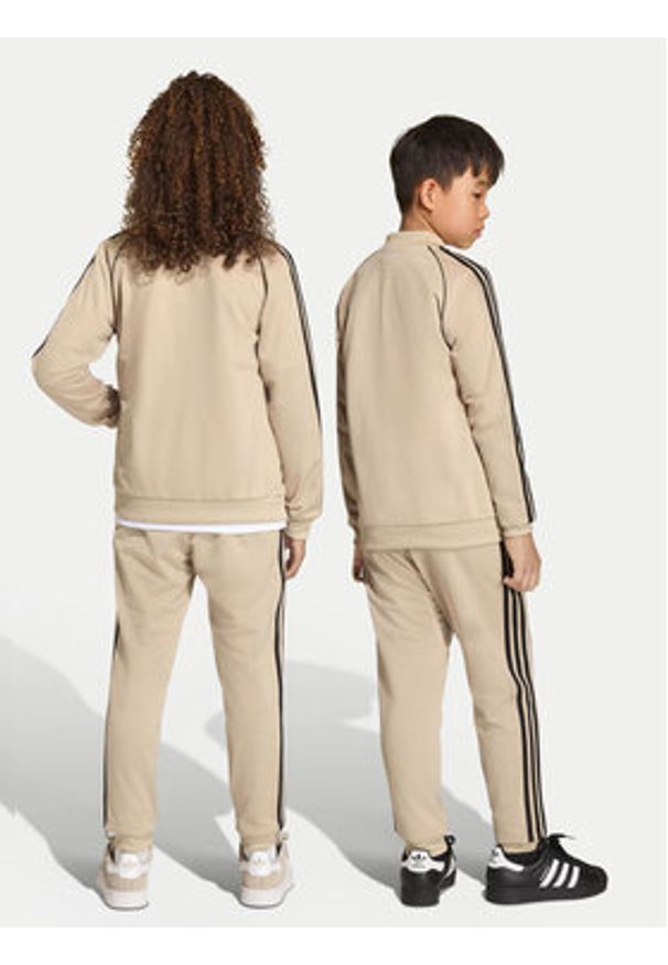 Adidas - adidas Spodnie dresowe adicolor SST KE2864 Beżowy Regular Fit. Kolor: beżowy. Materiał: syntetyk