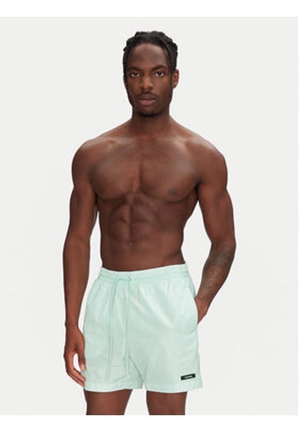 Calvin Klein Swimwear Szorty kąpielowe KM0KM01111 Zielony Regular Fit. Kolor: zielony. Materiał: syntetyk