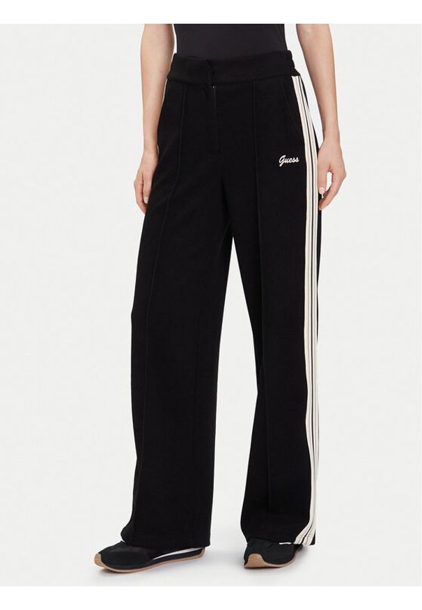Guess Spodnie dresowe V5BB16 KCX52 Czarny Wide Leg. Kolor: czarny. Materiał: syntetyk