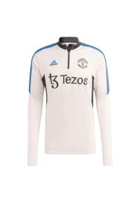 Adidas - Kurtka z dresu Manchester United Condivo 2022/23. Kolor: różowy. Materiał: dresówka