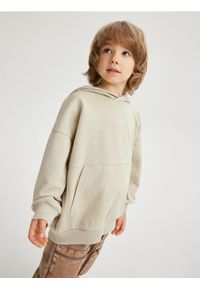 Reserved - Bluza oversize z kapturem - kremowy. Typ kołnierza: kaptur. Kolor: kremowy. Materiał: dzianina, bawełna