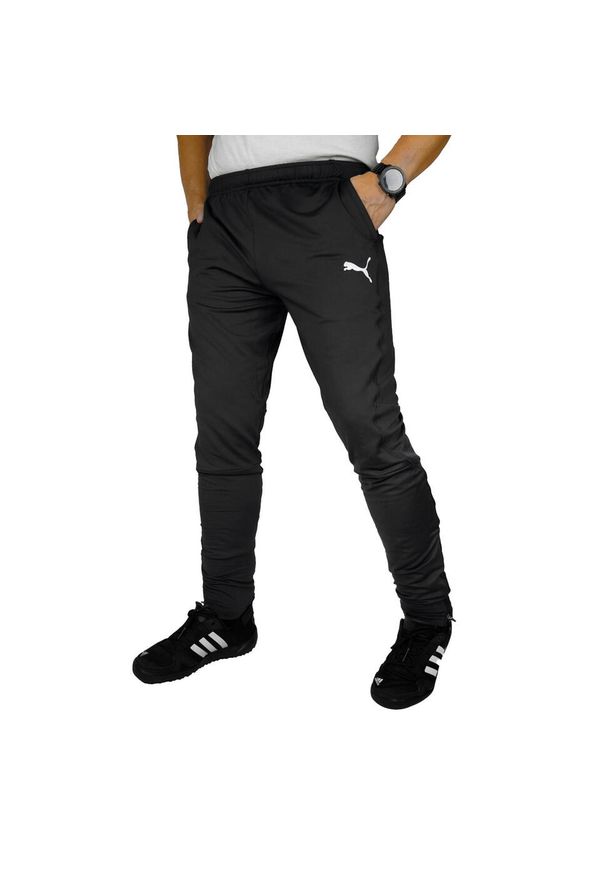 Puma - Męskie Spodnie Do Biegania Liga Pro. Kolor: czarny. Materiał: dresówka