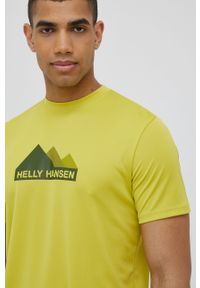 Helly Hansen t-shirt sportowy kolor żółty z nadrukiem. Kolor: żółty. Materiał: materiał, skóra. Wzór: nadruk. Styl: sportowy