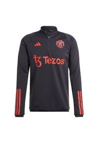 Bluza do piłki nożnej męska Adidas Manchester United Tiro 23 Training Top. Kolor: czarny. Materiał: materiał