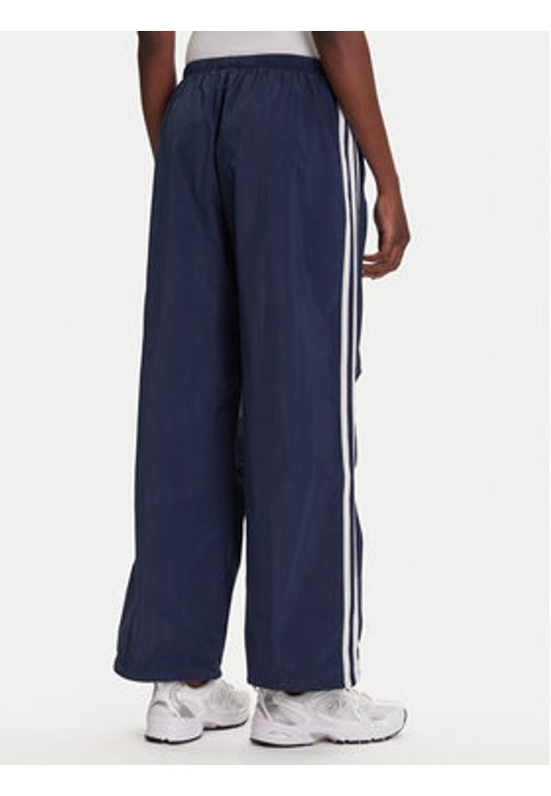 Adidas - adidas Spodnie dresowe 3-Stripes JD3127 Granatowy Loose Fit. Kolor: niebieski. Materiał: syntetyk
