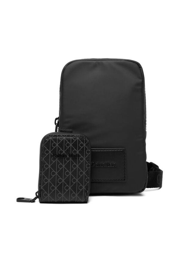 Calvin Klein Saszetka Puffer Utility Phone Crossbody LV04D1115G Czarny. Kolor: czarny. Materiał: materiał