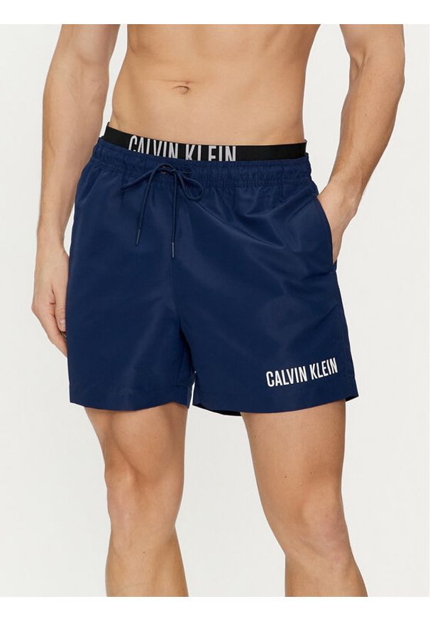 Calvin Klein Swimwear Szorty kąpielowe KM0KM00992 Granatowy Regular Fit. Kolor: niebieski. Materiał: syntetyk