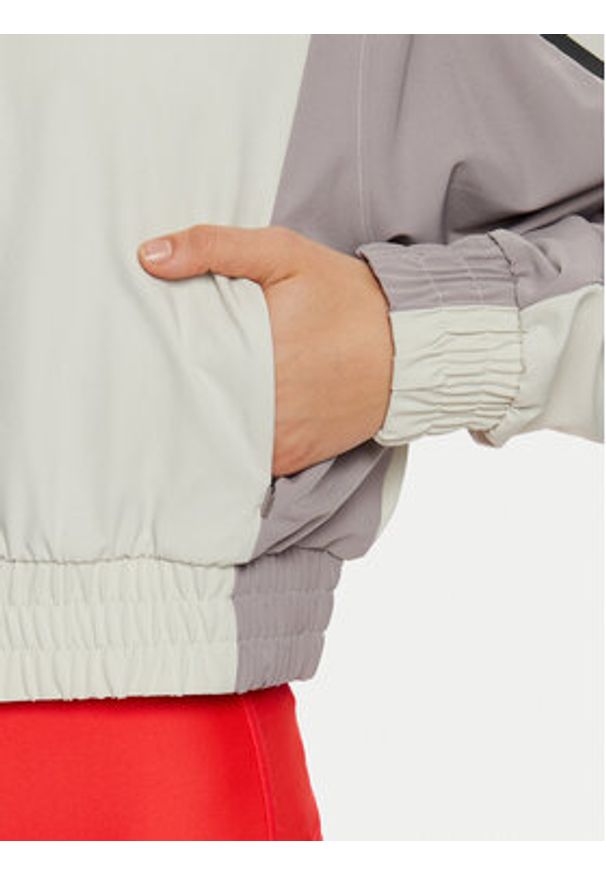 Under Armour Wiatrówka UA Unstoppable Crop 1386479 Écru Regular Fit. Materiał: syntetyk