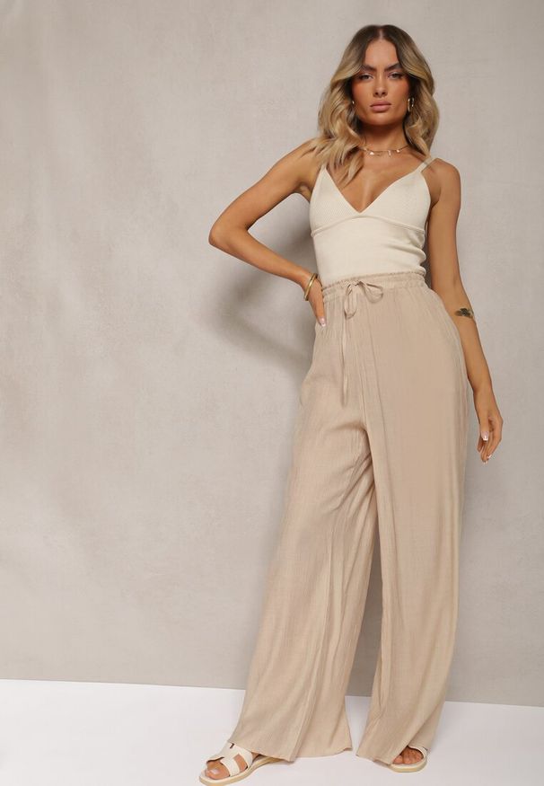 Renee - Beżowe Wiskozowe Spodnie Szerokie z Gumką i Sznurkiem w Pasie Tarallia. Okazja: na co dzień. Kolor: beżowy. Materiał: wiskoza. Styl: elegancki, casual