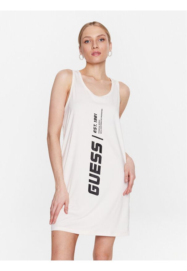 Guess Sukienka codzienna Ceara V3GP10 KBNV2 Beżowy Regular Fit. Okazja: na co dzień. Kolor: beżowy. Materiał: bawełna, syntetyk. Typ sukienki: proste. Styl: casual