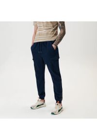 Sinsay - Spodnie jogger - Granatowy. Kolor: niebieski