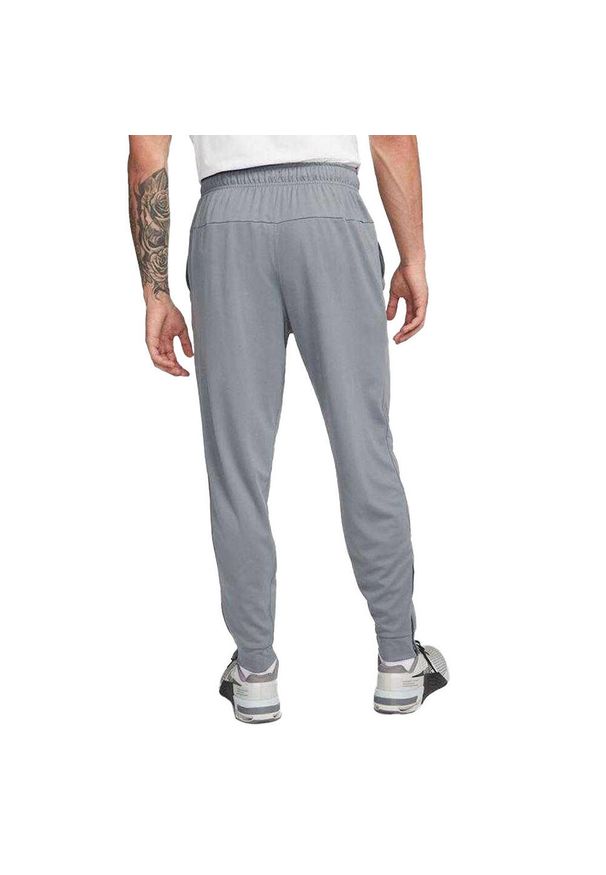 Nike - Męskie Spodnie Do Biegania Totality DriFIT. Kolor: szary, wielokolorowy, czarny. Długość: długie