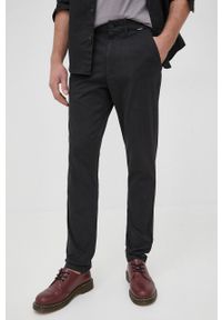 Calvin Klein spodnie męskie kolor czarny w fasonie chinos. Kolor: czarny. Materiał: bawełna, dzianina, materiał. Wzór: gładki
