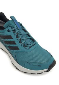 Adidas - adidas Buty do biegania Terrex Tracefinder 2 CLIMAPROOF Trail JR7770 Zielony. Kolor: zielony. Materiał: materiał. Technologia: ClimaProof (Adidas). Model: Adidas Terrex