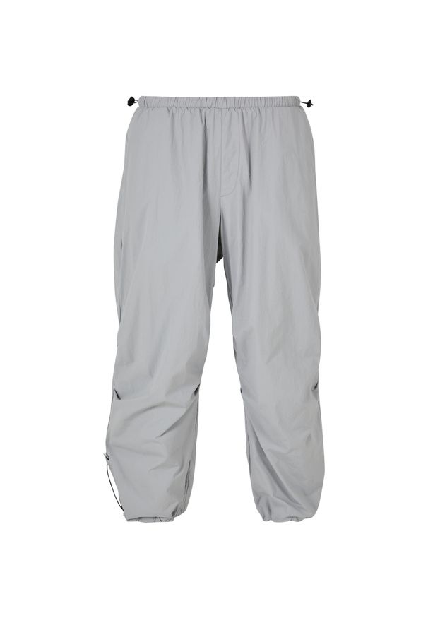 Nylonowe spodnie spadochronowe Urban Classics. Kolor: szary. Materiał: nylon