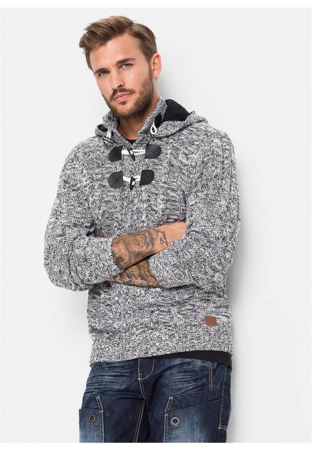 bonprix - Gruby sweter z kapturem z bawełną. Typ kołnierza: kaptur. Kolor: czarny. Materiał: dzianina, bawełna. Wzór: aplikacja, ze splotem