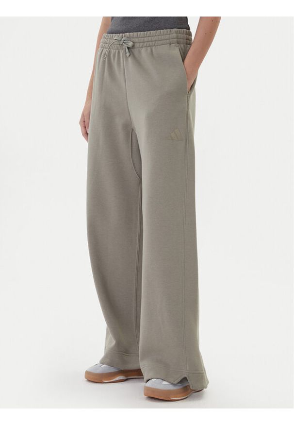 Adidas - adidas Spodnie dresowe ALL SZN Fleece JY5014 Beżowy Wide Leg. Kolor: beżowy. Materiał: bawełna