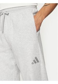 Adidas - adidas Spodnie dresowe Elevated ALL SZN Terry Loop IY6582 Szary Loose Fit. Kolor: szary. Materiał: dresówka