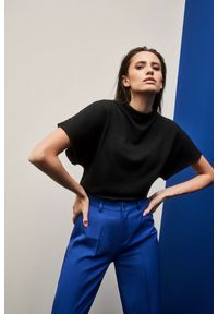 MOODO - Elegancka bluzka z szerokimi rękawami czarna. Kolor: czarny. Materiał: poliester, elastan. Styl: elegancki #1