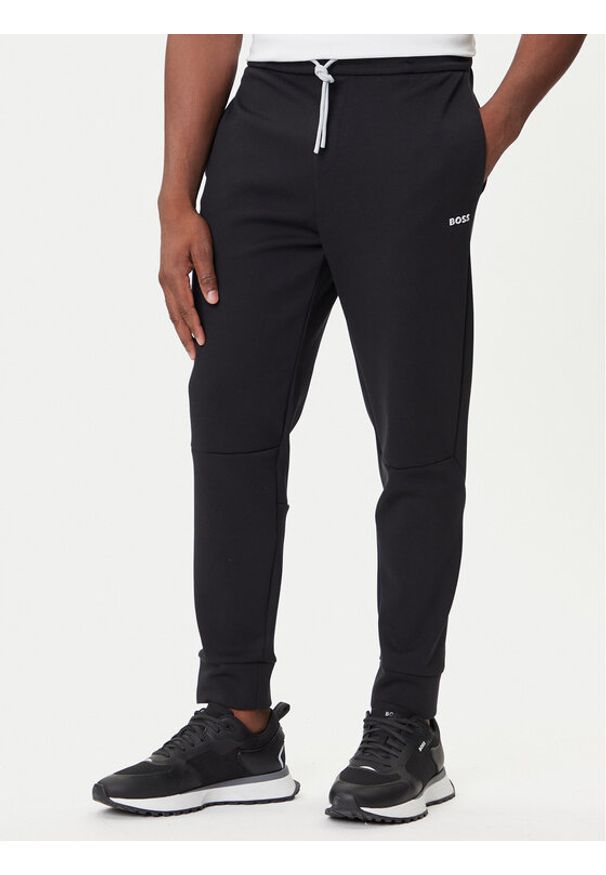 BOSS Spodnie dresowe Zone 50543070 Czarny Regular Fit. Kolor: czarny. Materiał: bawełna, syntetyk
