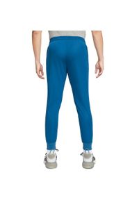 Nike - Męskie Spodnie Do Biegania Libero DriFIT. Kolor: niebieski