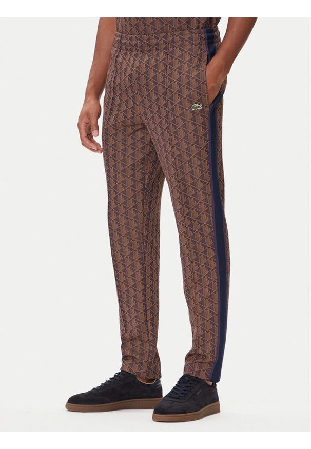 Lacoste Spodnie dresowe XH1440 Brązowy Regular Fit. Kolor: brązowy. Materiał: syntetyk