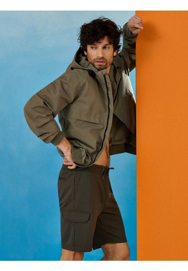 Sinsay - Szorty slim cargo - zielony. Kolor: zielony