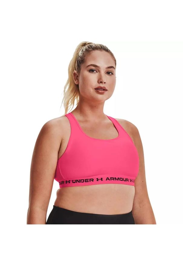 Biustonosz sportowy Under Armour Crossback Mid Bra. Kolor: różowy