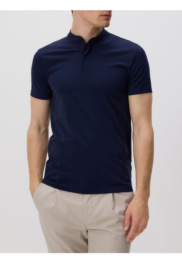 Reserved - Koszulka polo slim - granatowy. Typ kołnierza: polo. Kolor: niebieski. Materiał: wiskoza, dzianina