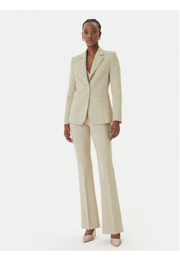 Rinascimento Spodnie materiałowe CFC0127876003 Beżowy Slim Fit. Kolor: beżowy. Materiał: syntetyk