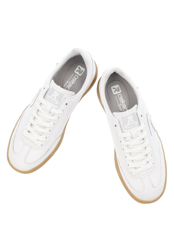 Białe Sneakersy Rieker Modne Płaskie Obuwie Damskie. Okazja: na co dzień. Zapięcie: sznurówki. Kolor: biały. Materiał: guma, skóra. Szerokość cholewki: normalna