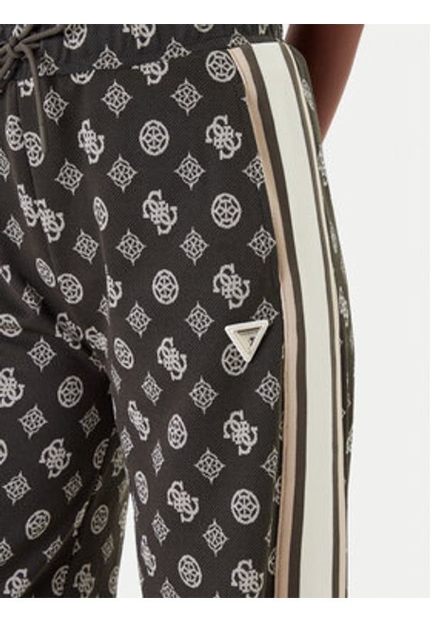Guess Spodnie dresowe V5YB10 K0282 Zielony Relaxed Fit. Kolor: zielony. Materiał: syntetyk